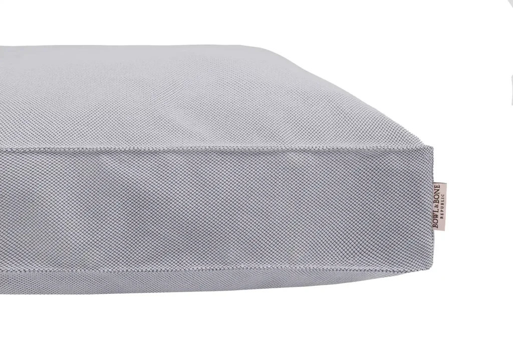 dog cushion grey close-up
