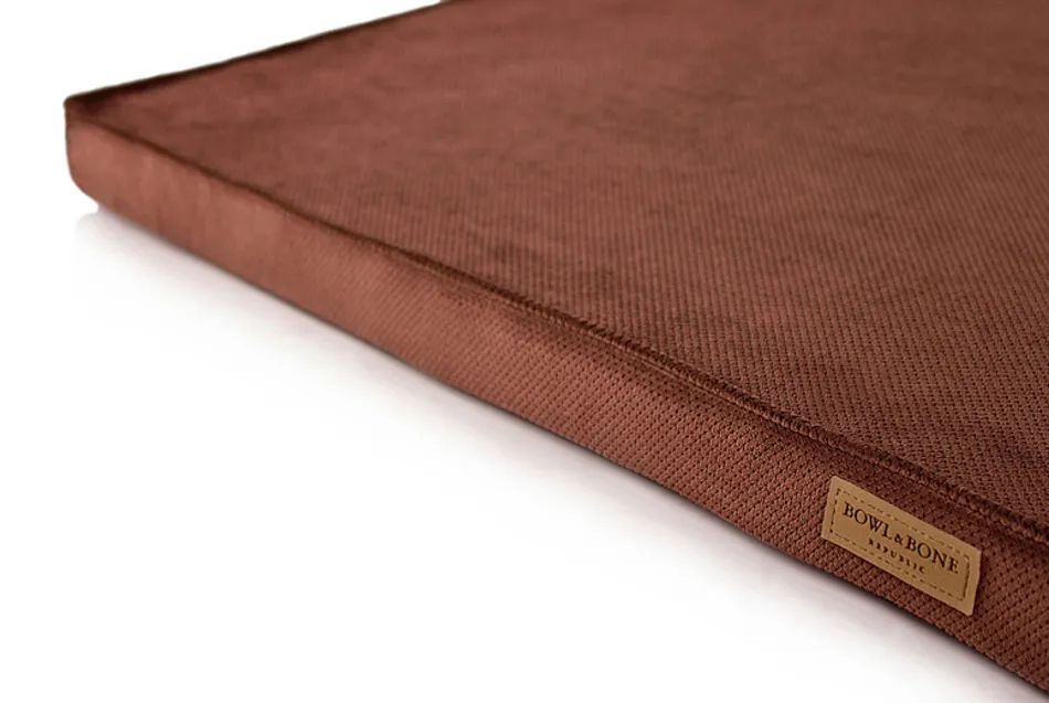 brown foam dog mat close-up