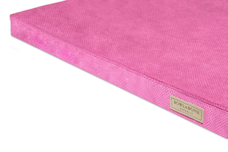 pink foam dog mat close up