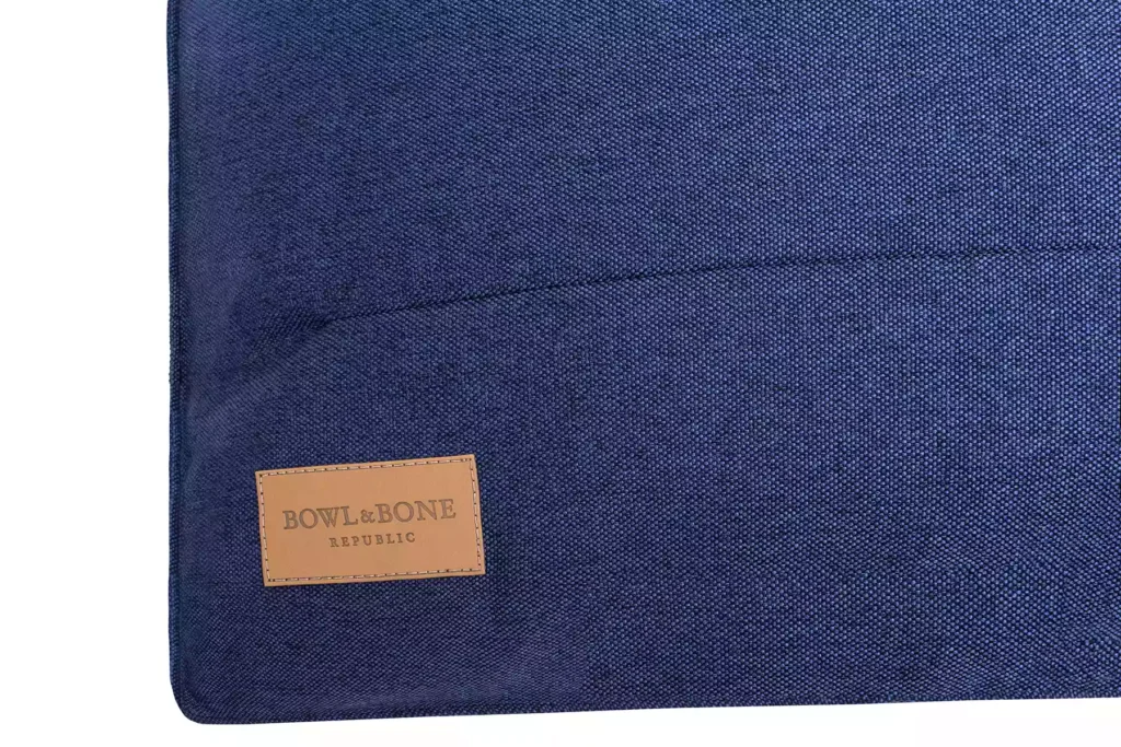 dog pillow navy close-up