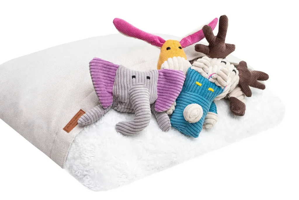 dog sleeping bag cream with toys