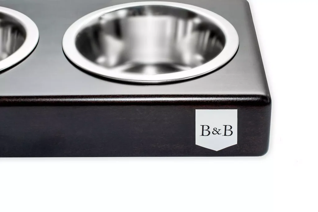 dog bowl duo deep brown with wooden frame close-up