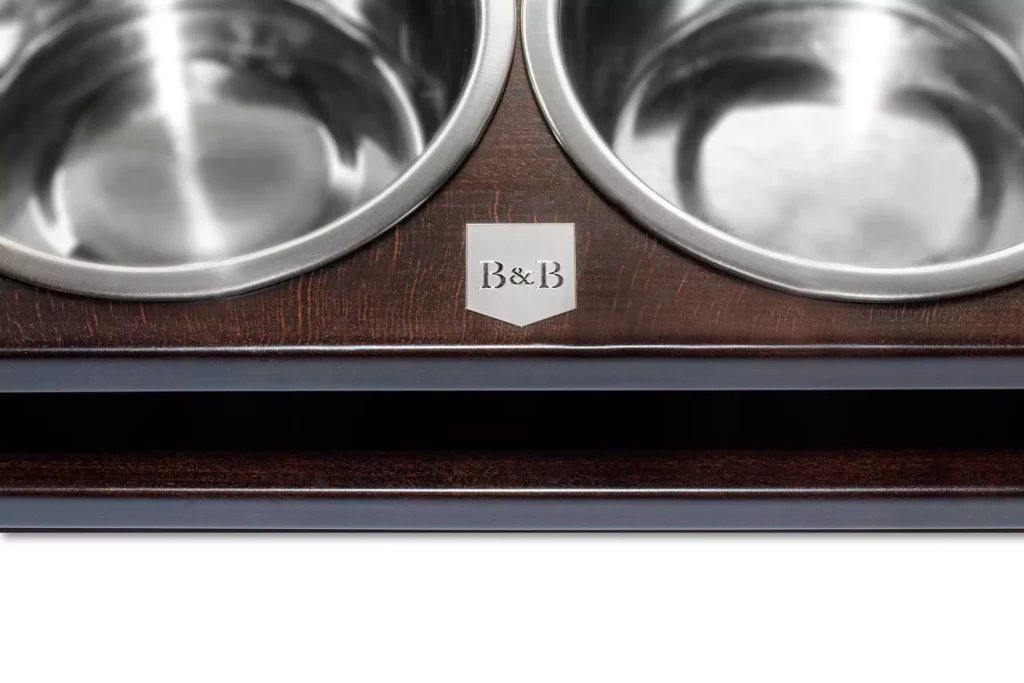 dog bowl duo brown with wooden frame close-up