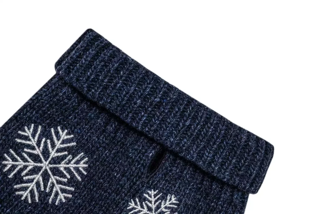 dog sweater snowflake navy close-up